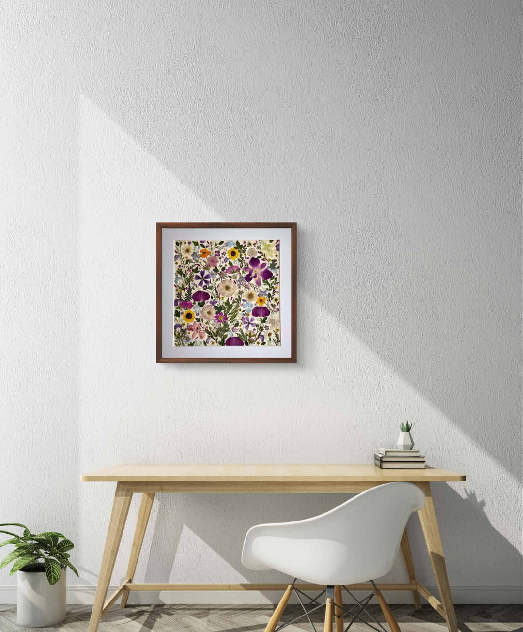 15.7 inch width 15.7 inch height pressed flower frame art that has vibrant and colorful petals formed design hanging on the wall.