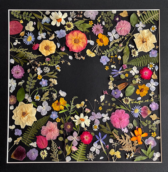 black background pressed flower frame art with flower petals details