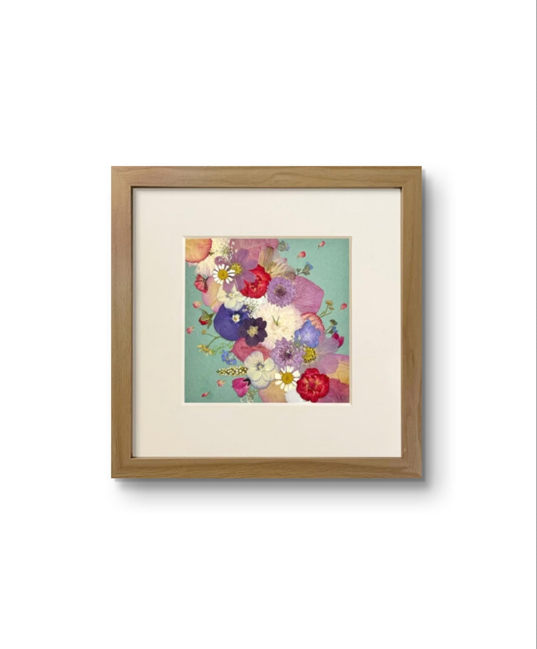 10 inches width 10 inches height pressed flower frame art that is green theme.