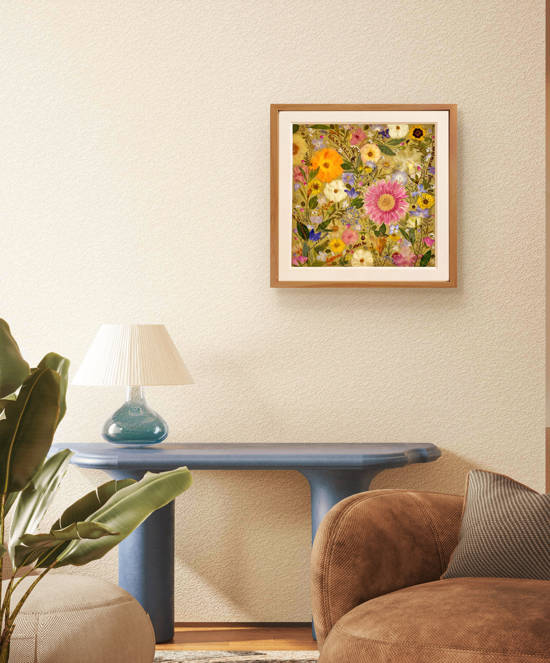 bright theme of pressed flower frame art that used different dried petals filled in every space of canvas hanging on living room wall.