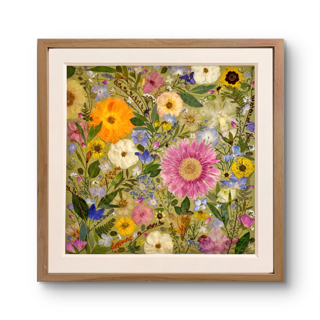 bright theme of pressed flower frame art that used different dried petals filled in every space of canvas.