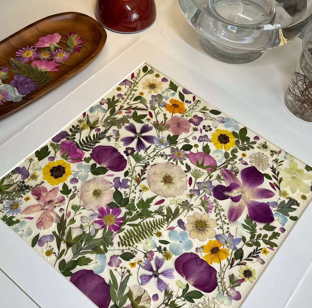 Making process of 15.7 inch width 15.7 inch height pressed flower frame art that has vibrant and colorful petals formed design.